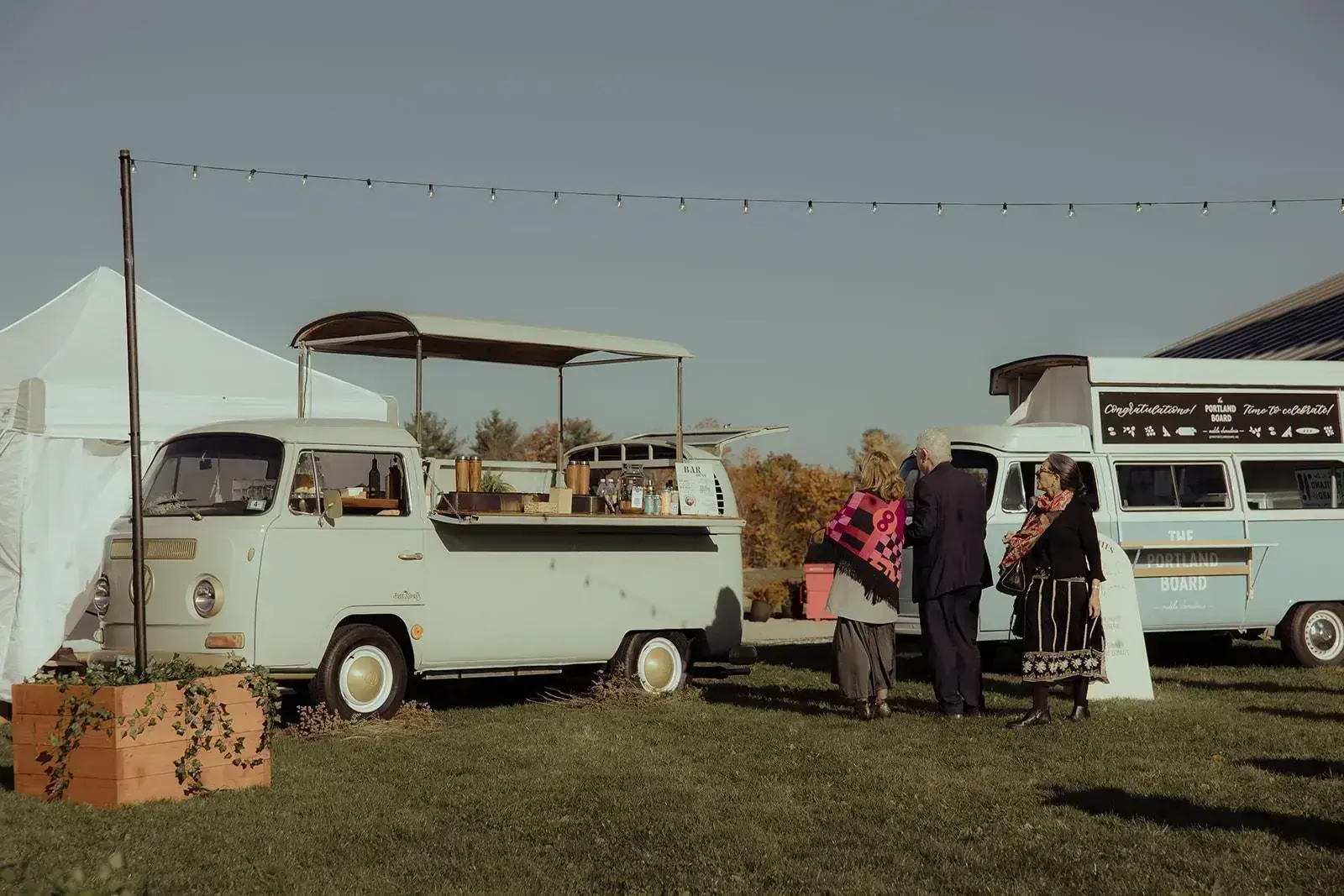 The VW bus bar and Portland Board bus set up in the courtyard during cocktail hour