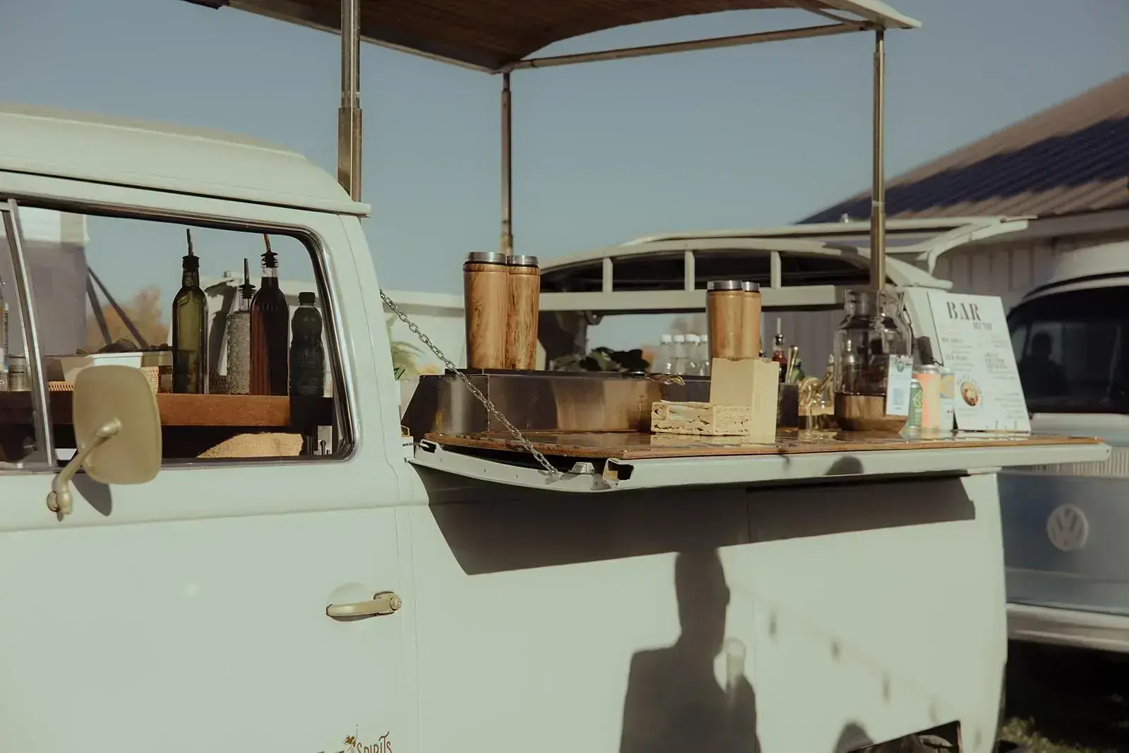 VW bus bar set up for cocktail hour in the afternoon sun